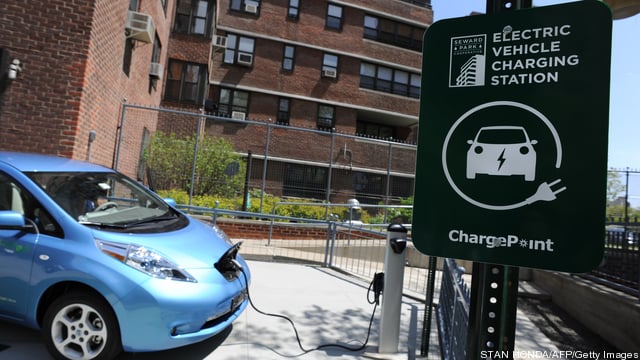 A Nissan Leaf electric car is plugged in