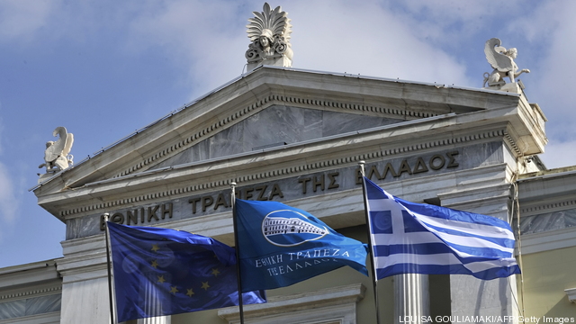 EU, banks' and Greek flags flutter at th