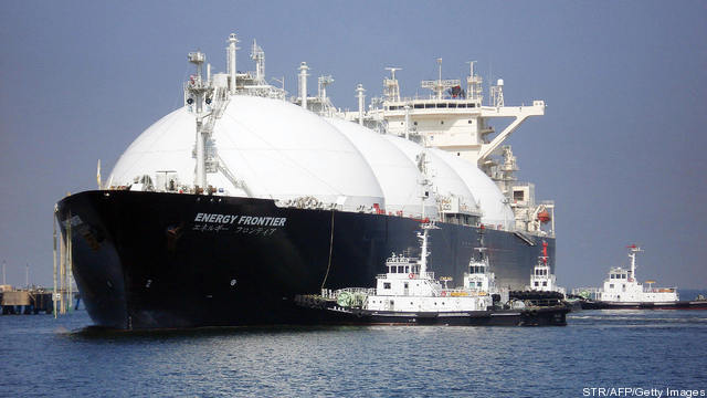 A liquefied natural gas (LNG) tanker arr