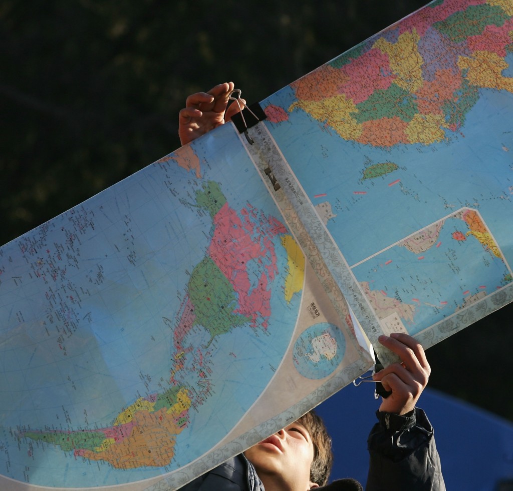 Chinese Man Clears A Chinese National Map In Beijing