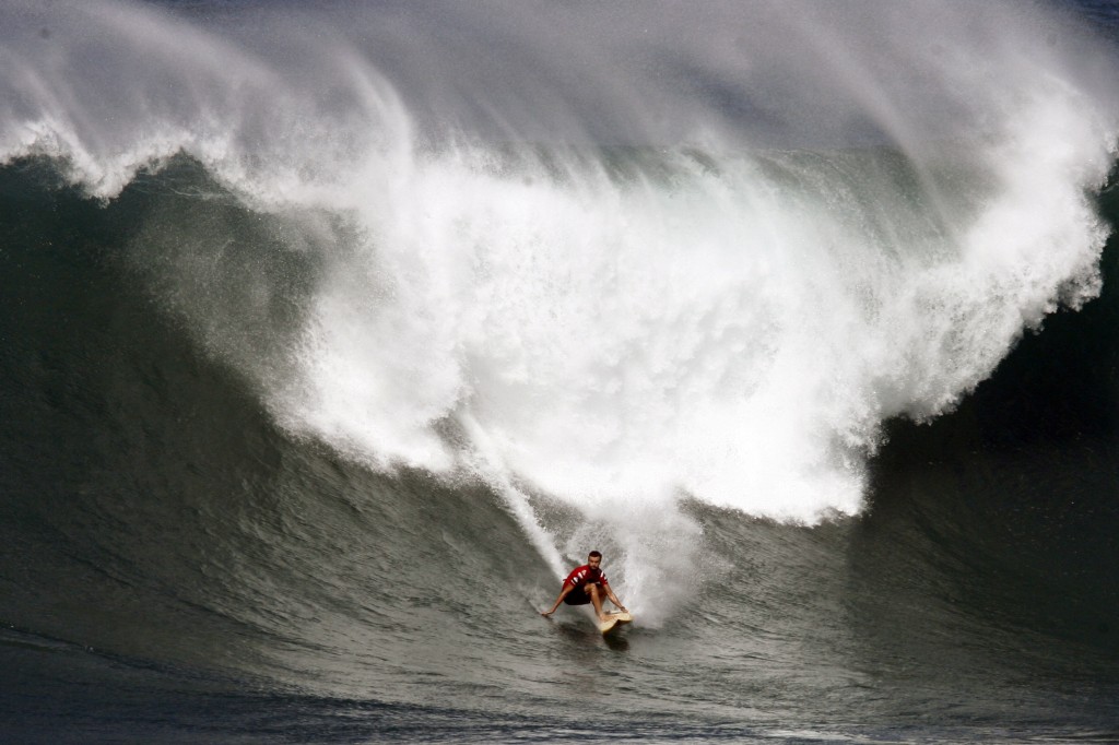 Big Wave Surfers And Onlookers Flock To Oahu's North Shore For Large Swells