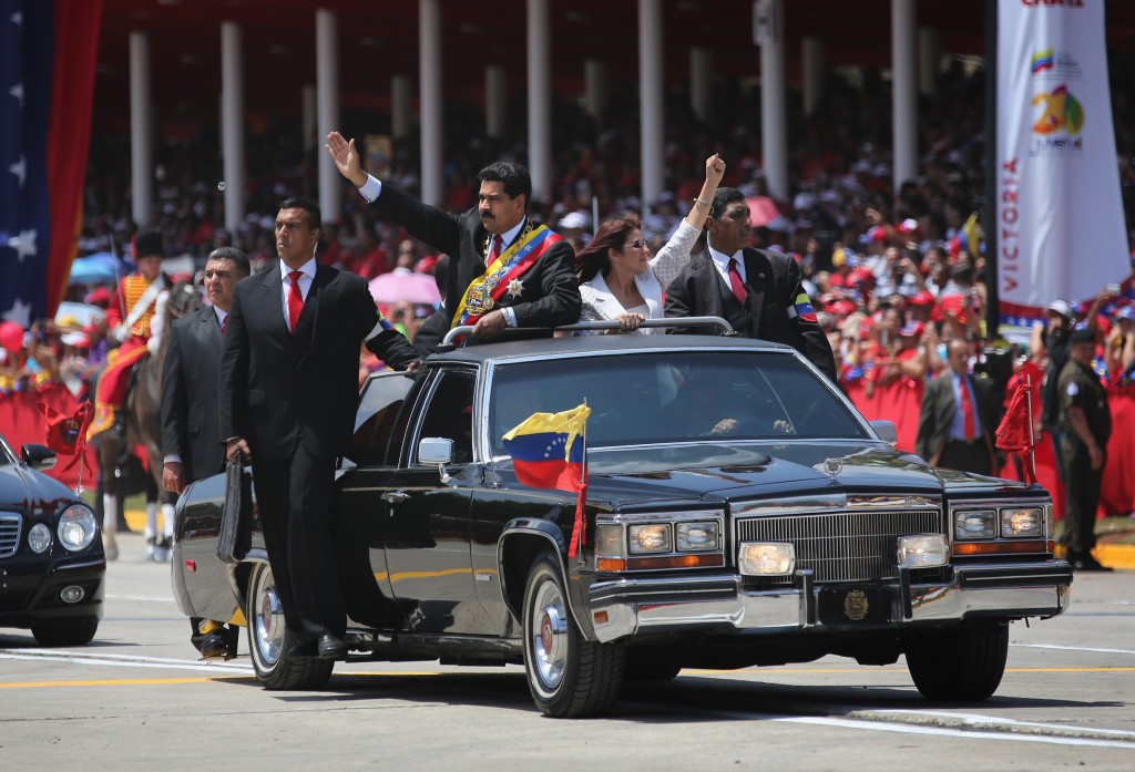 Venezuelans Loyal To Former President Hugo Chavez Mark One Year Anniversary Of His Death