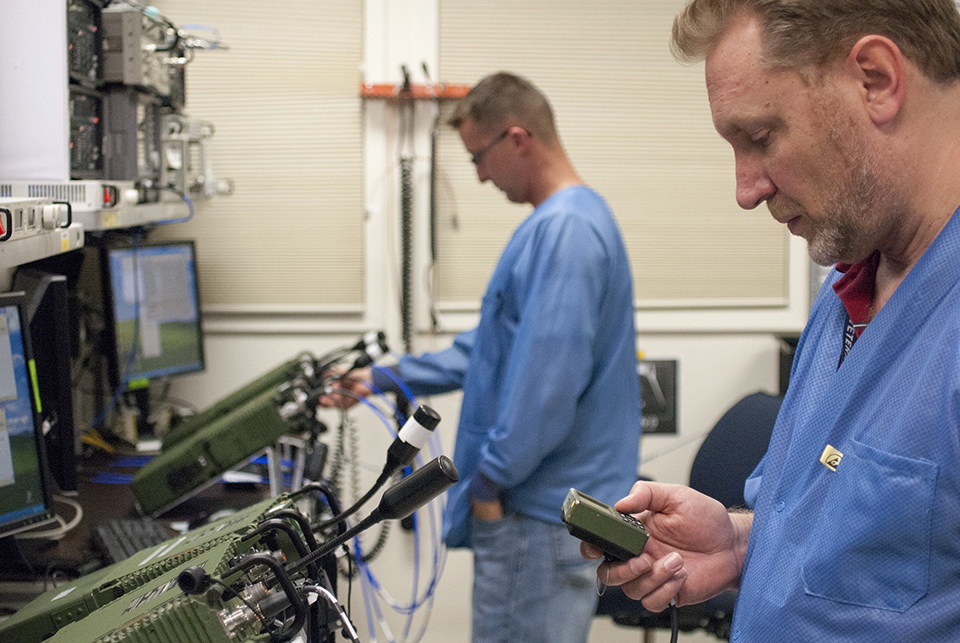 General Dynamics employees building AN/PRC-155 Manpack radios for the Army.