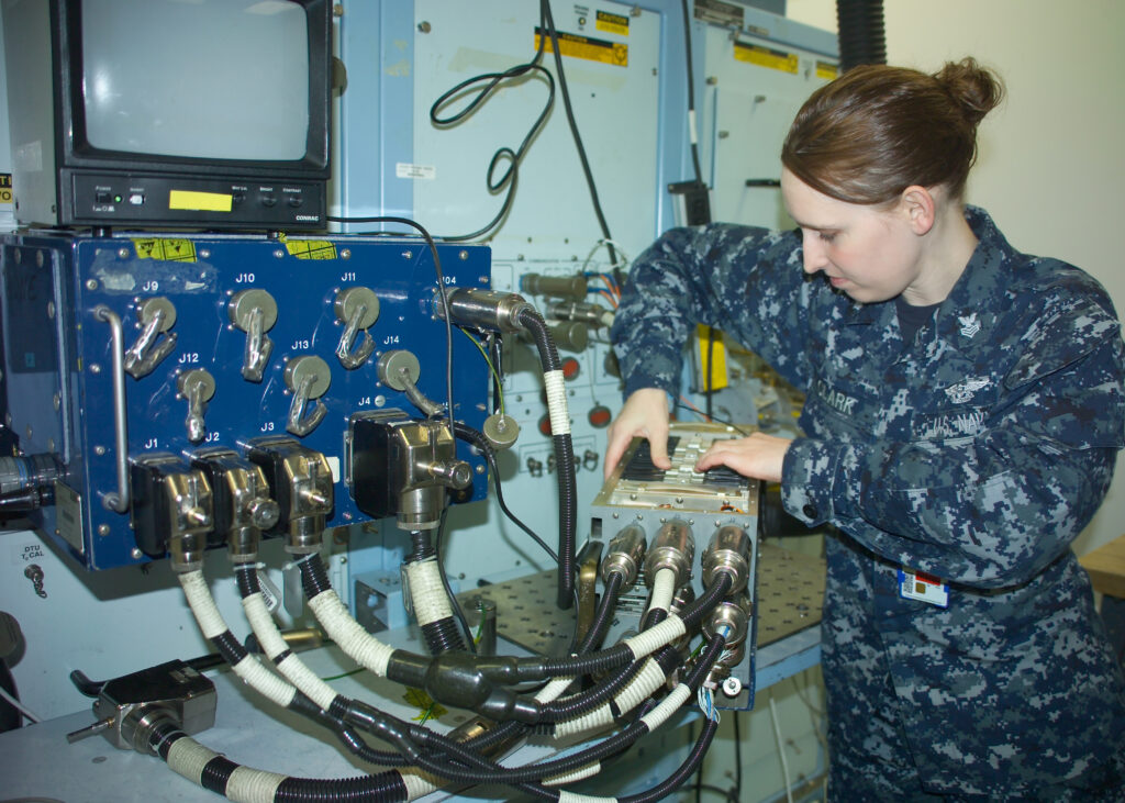 Female Navy Sailor with circuits & cables 11_25A