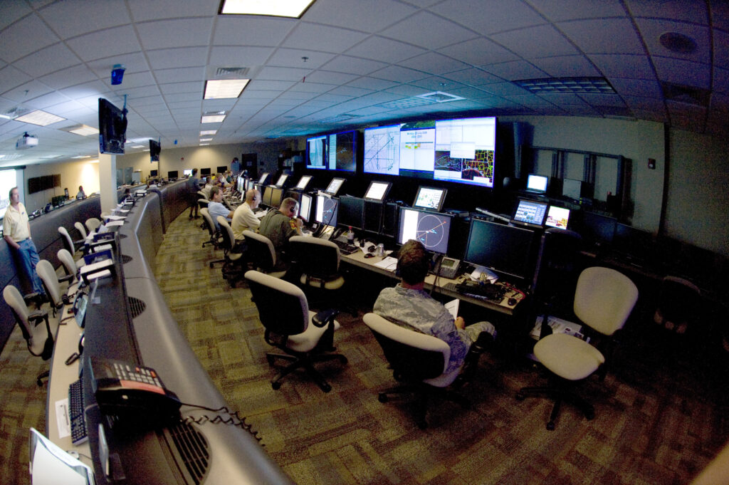 EGLIN AIR FORCE BASE, Fla. -- Exercise controllers in the 46th Test Squadrons Air Operations Center control the airspace and ground personnel participating in the Bold Quest Plus exercise held on Eglin ranges in 2008. Bold Quest Plus is designed to test in field conditions the updates and upgrades in the tactics, techniques and procedures used by coalition and U.S. forces to improve combat identification. The TTPs and technology was being developed and tested as part of the exercise, if successful, can be fielded almost immediately. (Department of Defense photo/Staff Sgt. Joe Laws)