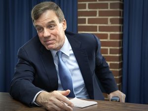 Sen. Mark Warner, a former venture capitalist, says that speeding the process from development to market for composites "passes the smell test" with him. Credit: NASA/Sean Smith