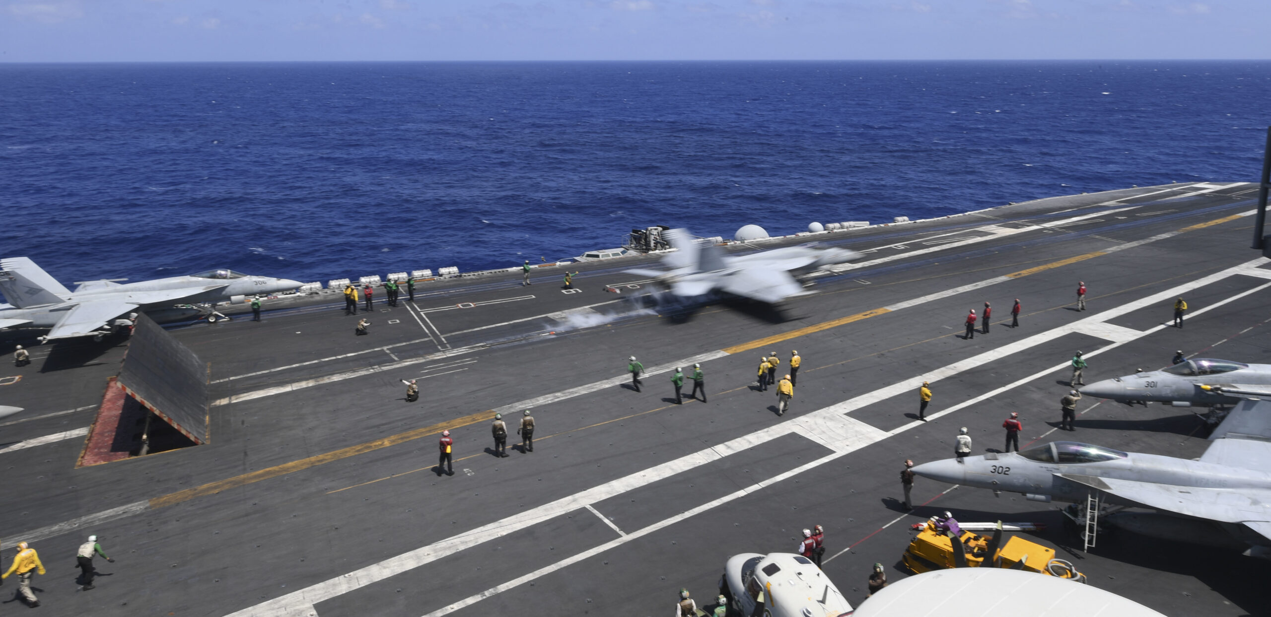 COVID-19 Strikes A Supercarrier;  ‘Months’ Of Virus, Esper Says