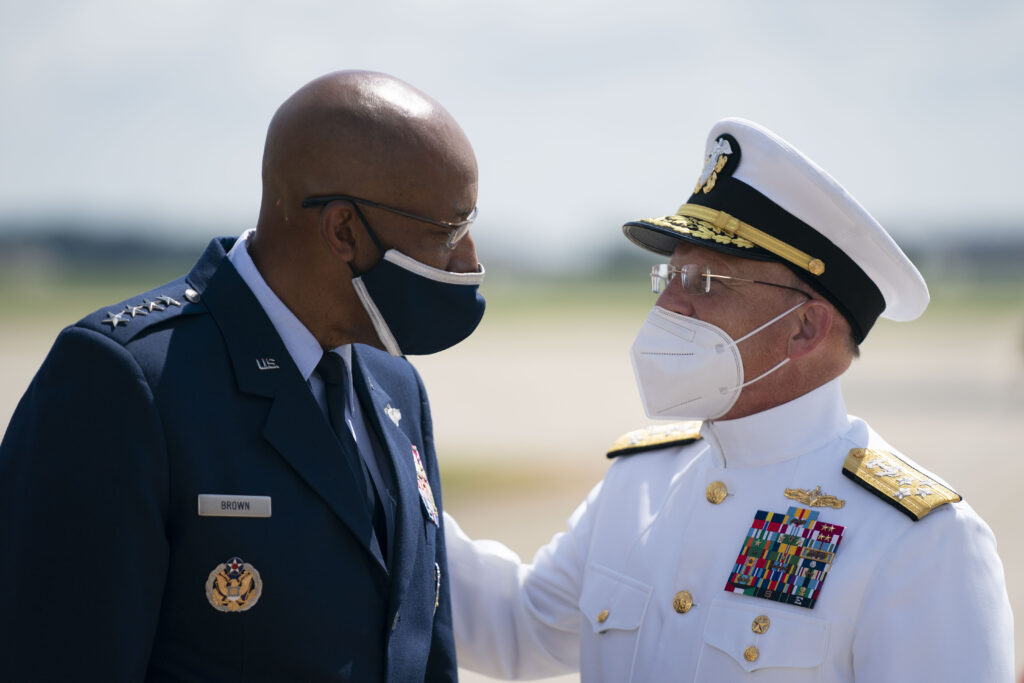 Chief of Naval Operations Adm. Mike Gilday, right, attends the transfer of responsibility ceremony where Gen. Charles Q. Brown, Jr., left, assumed the duties as Air Force Chief of Staff from Gen. David L. Goldfein at Joint Base Andrews, MD, Aug. 6, 2020