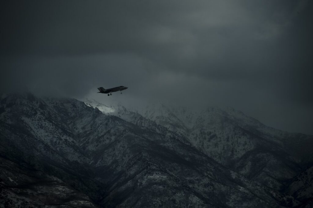 An F-35A Lightning II Fighting flies past the Wasatch Mountains by Hill Air Force Base on Dec 7, 2016. The F-35A is a single-seat, single engine, fifth generation, multirole fighter that’s able to perform ground attack, reconnaissance and air defense missions with stealth capability. (U.S. Air Force photo by Staff Sgt. Andrew Lee) 