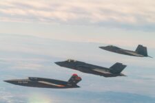 XQ-58A flies in formation with F-22 and F-35