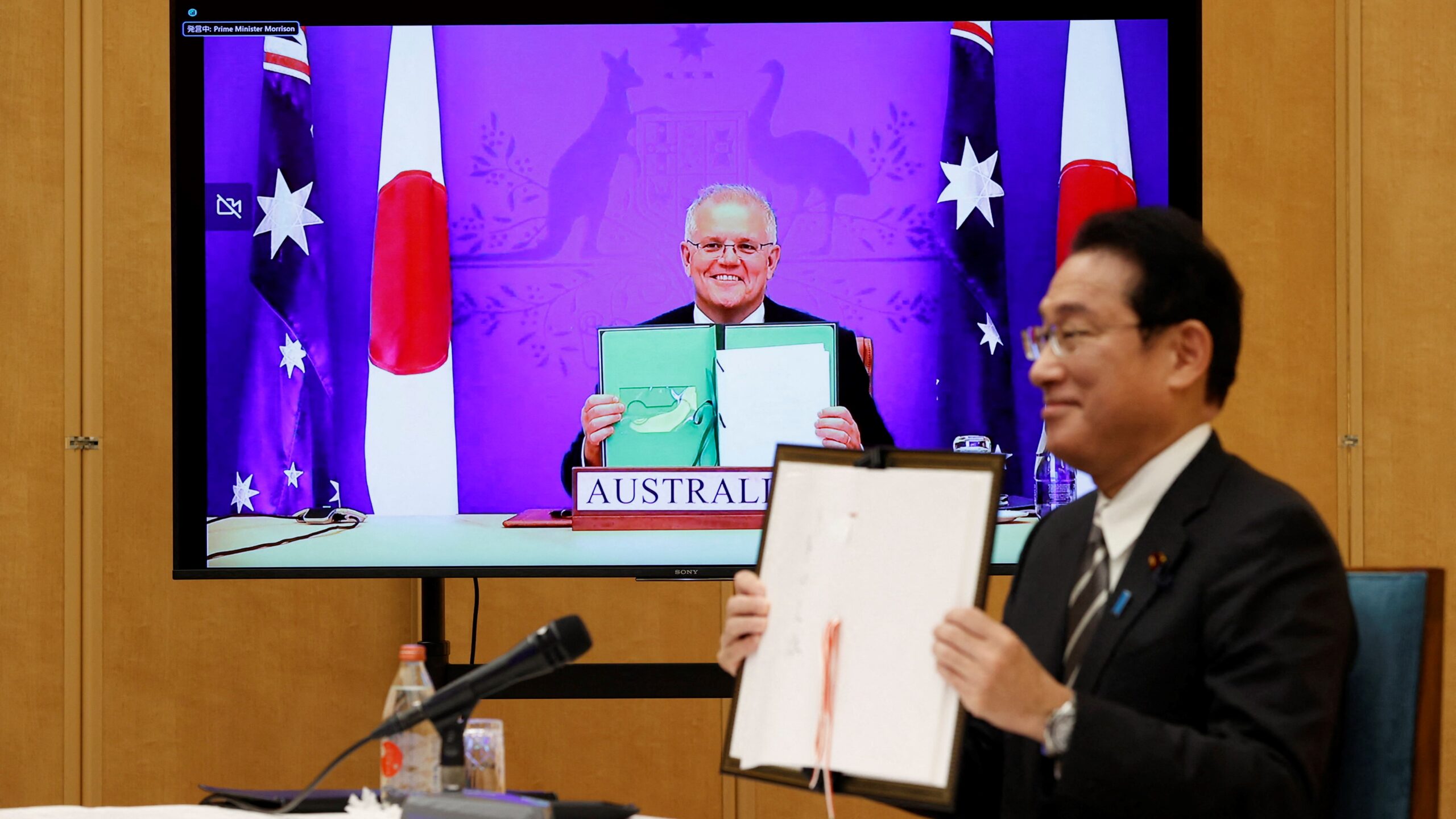 China grumbles as Japan, Aussies ink treaty to meld forces