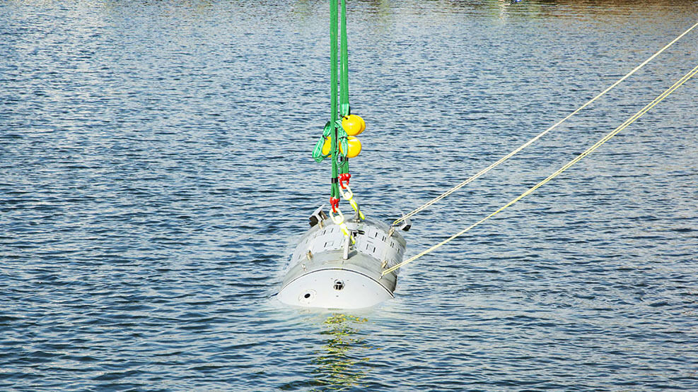 NUWC Division Newport, PEO team christen Snakehead UUV at Narragansett Bay Test Facility