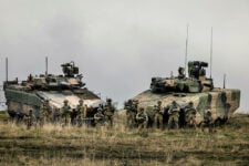 Aussies plan massive armored cuts; review charts shift to power projection