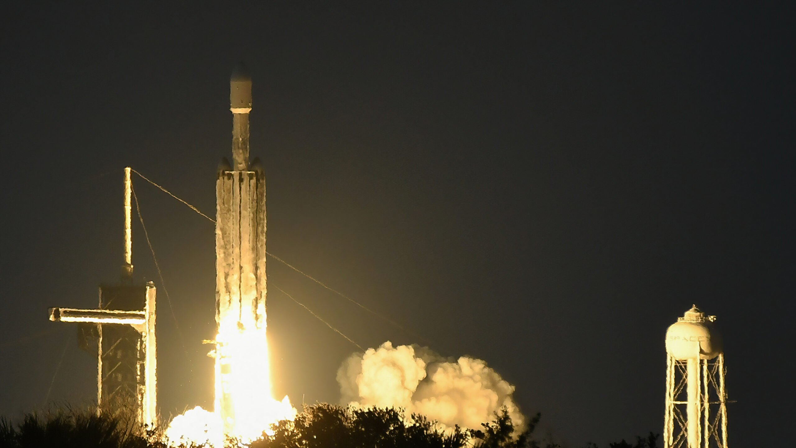 A SpaceX Falcon Heavy rocket launches from pad 39A at the