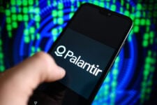 In this photo illustration the Palantir logo is displayed on